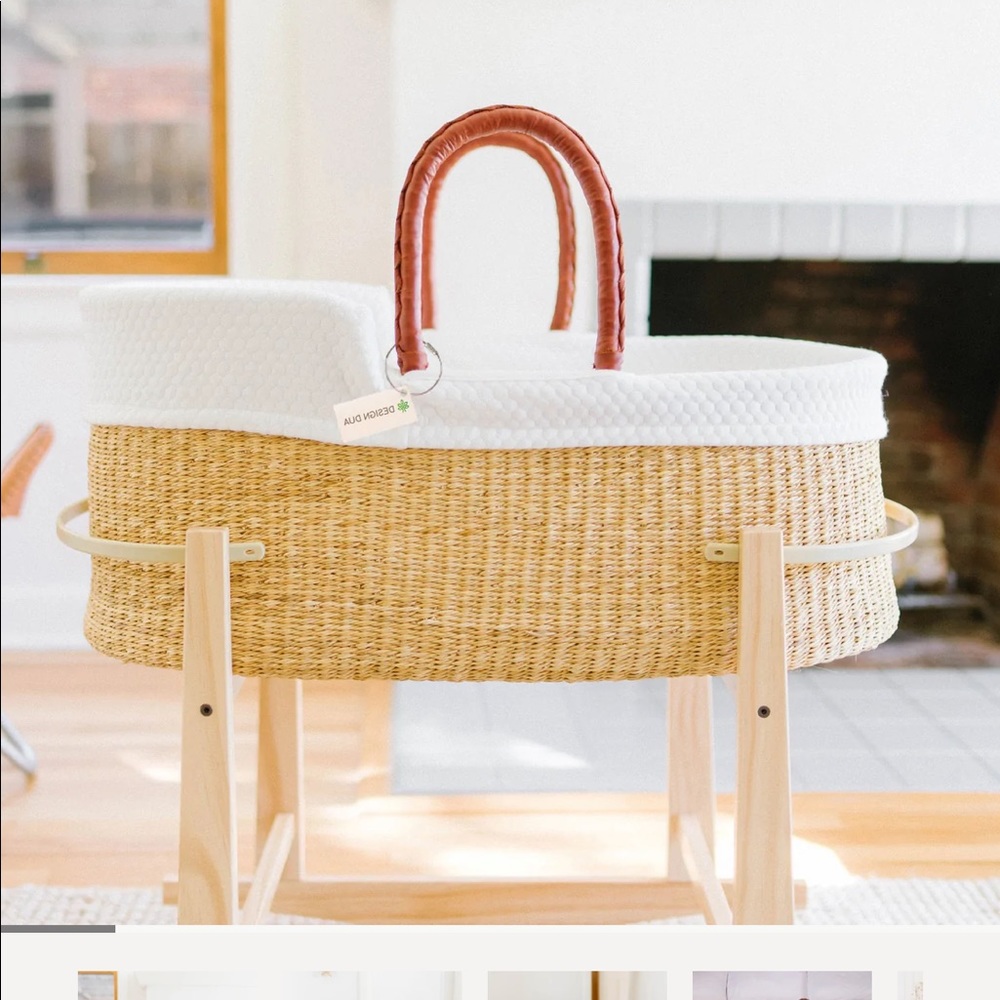 Design Dua baby bassinet with stand, mattress, cover, and sheet